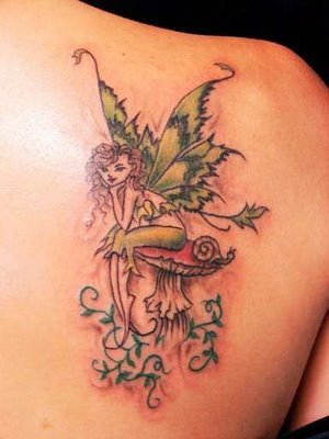 female with fairy tattoo designs. female with fairy tattoo designs