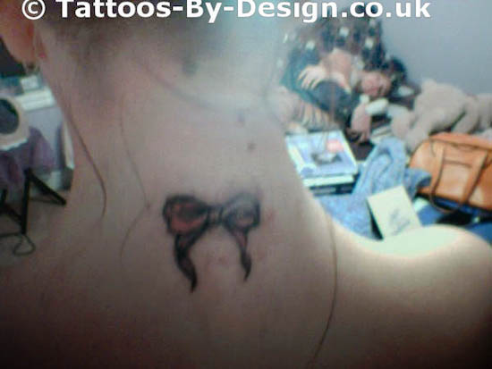 Symbolic pink ribbon tattoo designs are everywhere - cars sport yellow
