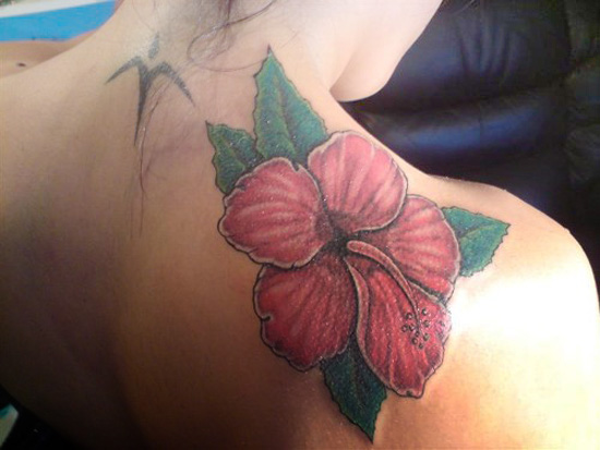 small flower tattoo designs for girls. Red hawaiian flower tattoo