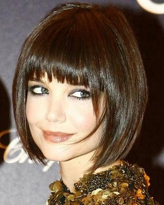Rihanna is wearing a short hairstyle with bangs. Bangs have been a great way Rihanna is wearing a short hairstyle with bangs. Bangs have been a great way