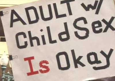 ... holding this sign - he says he opposes adults having sex with children, ... ... holding this sign - he says he opposes adults having sex with children, ...