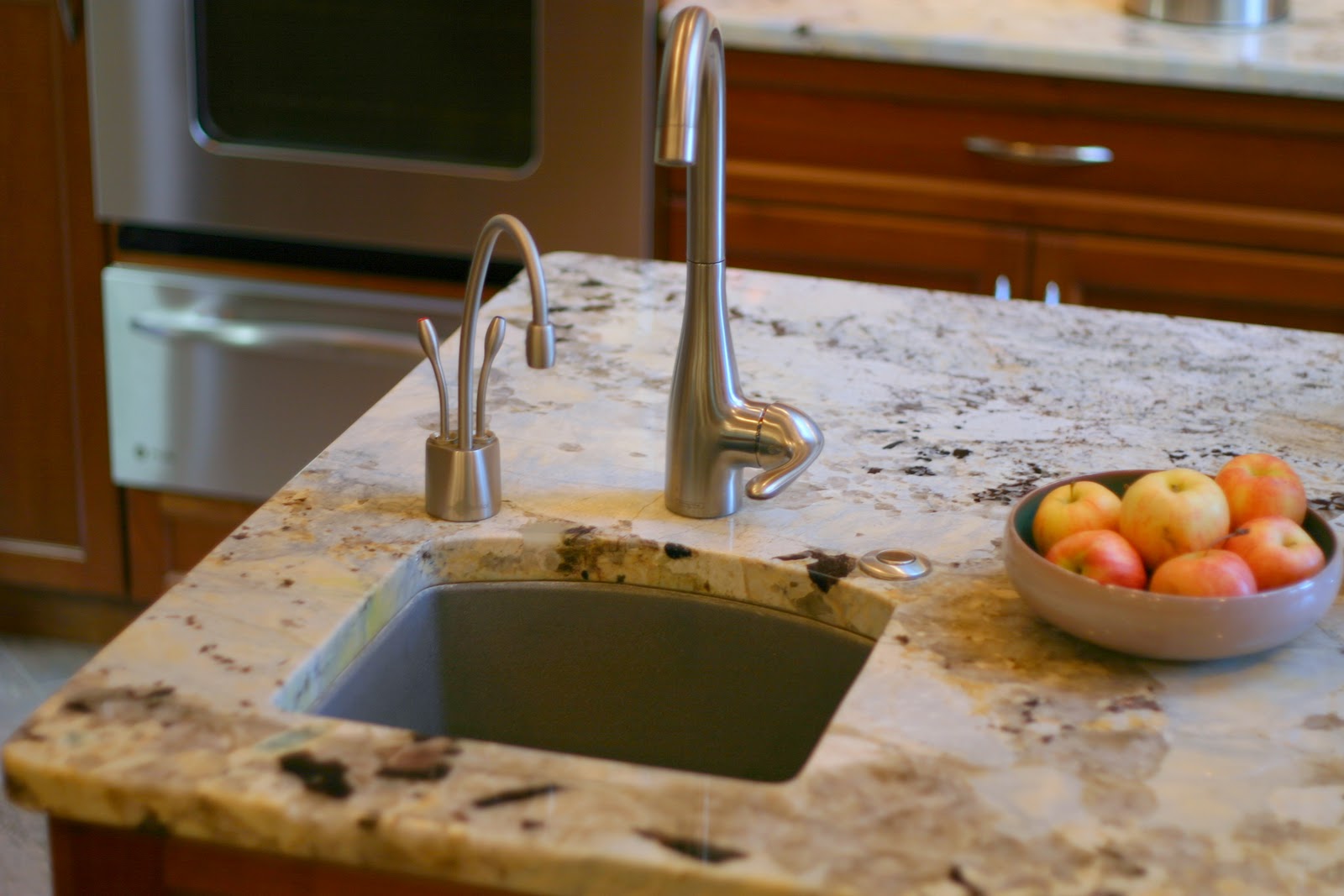 ... is natural stone with a decorative border of stone and crushed glass