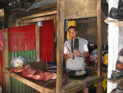 the meat and its' maker at the market