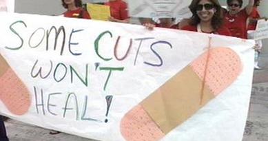 [080313_teachers_miami_dade_health_insurance_cuts.jpg]