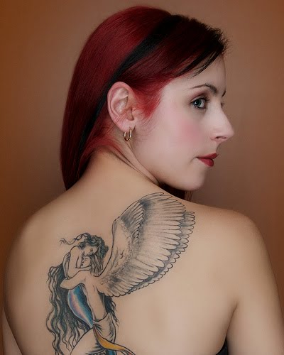 angel tattoo on a woman's body angel tattoo on a woman's body