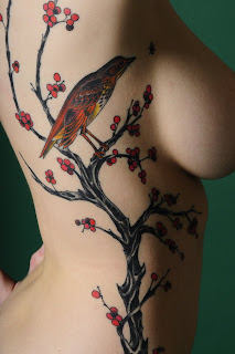 Pretty Bird tattoo on Breast Side