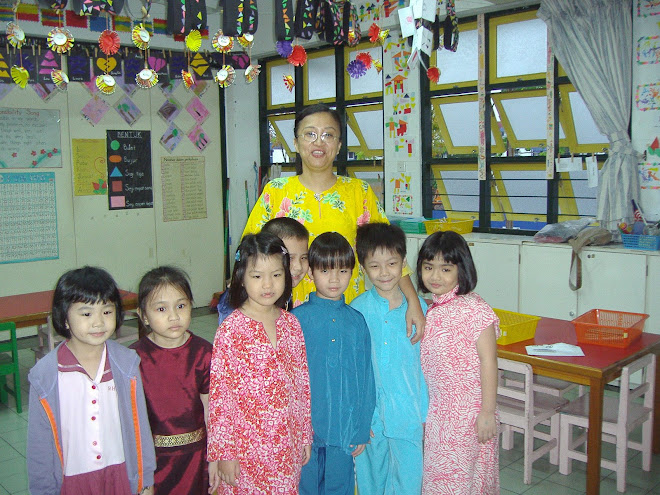 John with friends @ Rhema in Malay dress