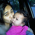 Masayu Anastasia kisses her baby girl