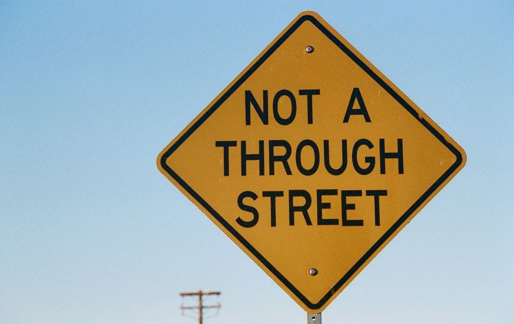 skin the kitty not a through street sign