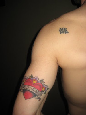 Name Tattoo Just above his behind is a big, and very noticeable,