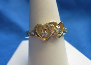 Custom made anniversary ring in 14 karat yellow gold by jewelry designer Tony Payne