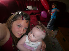 The girly one (and her baby sister)