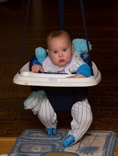 Mason in the bouncy swing