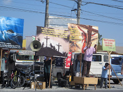 Bro. Duenas'  Street Preaching in front of a Bus Terminal