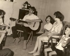 My family in Georgia singing while Bob plays the guitar