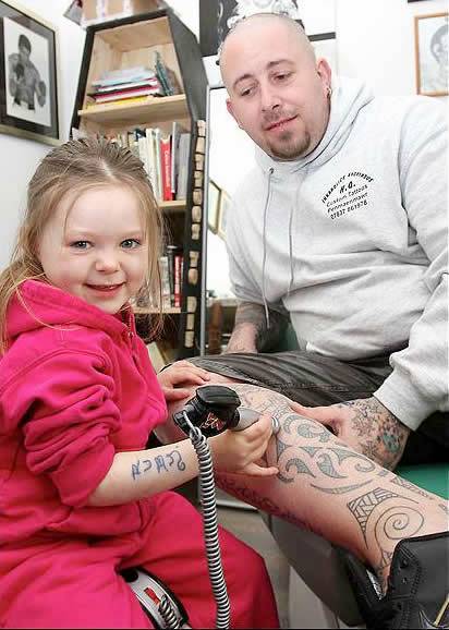 The toddler is set to become the world's youngest tattoo artist after 