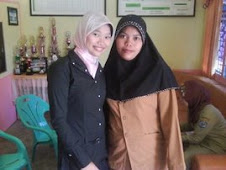Hera with another teacher in her mother office