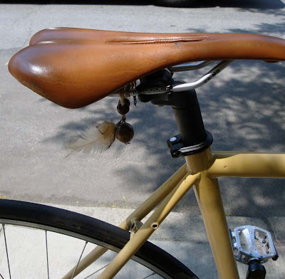 Wooden Beads and Feathers on a bike