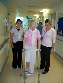 At last she's up and walking!! Sarah with Claire the physio!!!