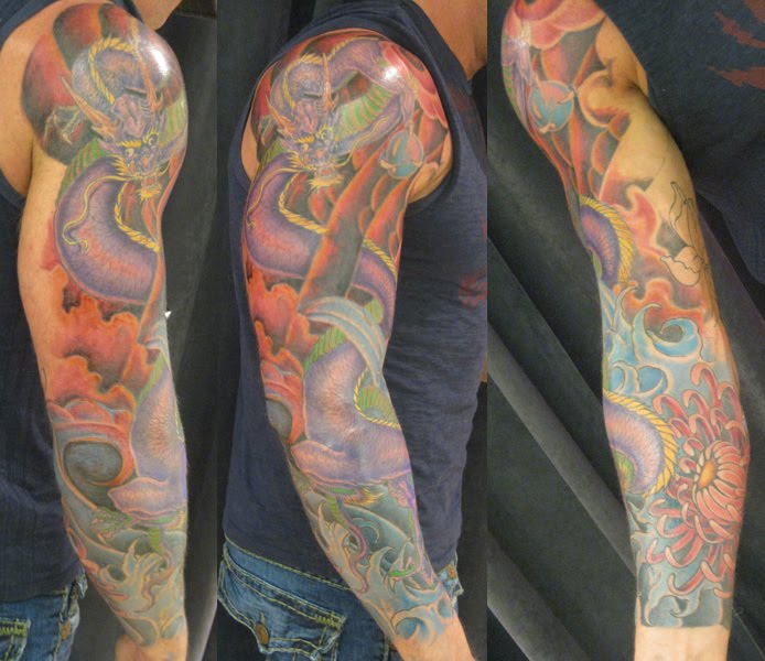 Tribal Dragon Tattoos On Arm. tribal dragon tattoos arm.