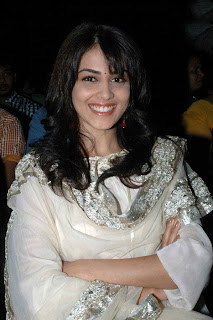 genelia in white dress at a movie launch cute stills