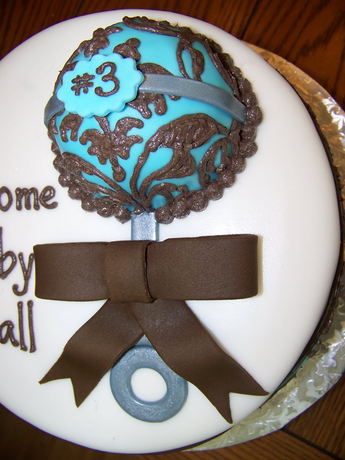 Plumeria Cake Studio Fancy Baby Rattle Cake