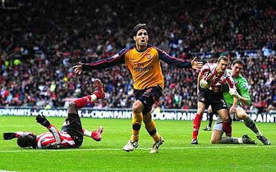 Saviour: Cesc Fabregas scores late in injury time at the Stadium of Light