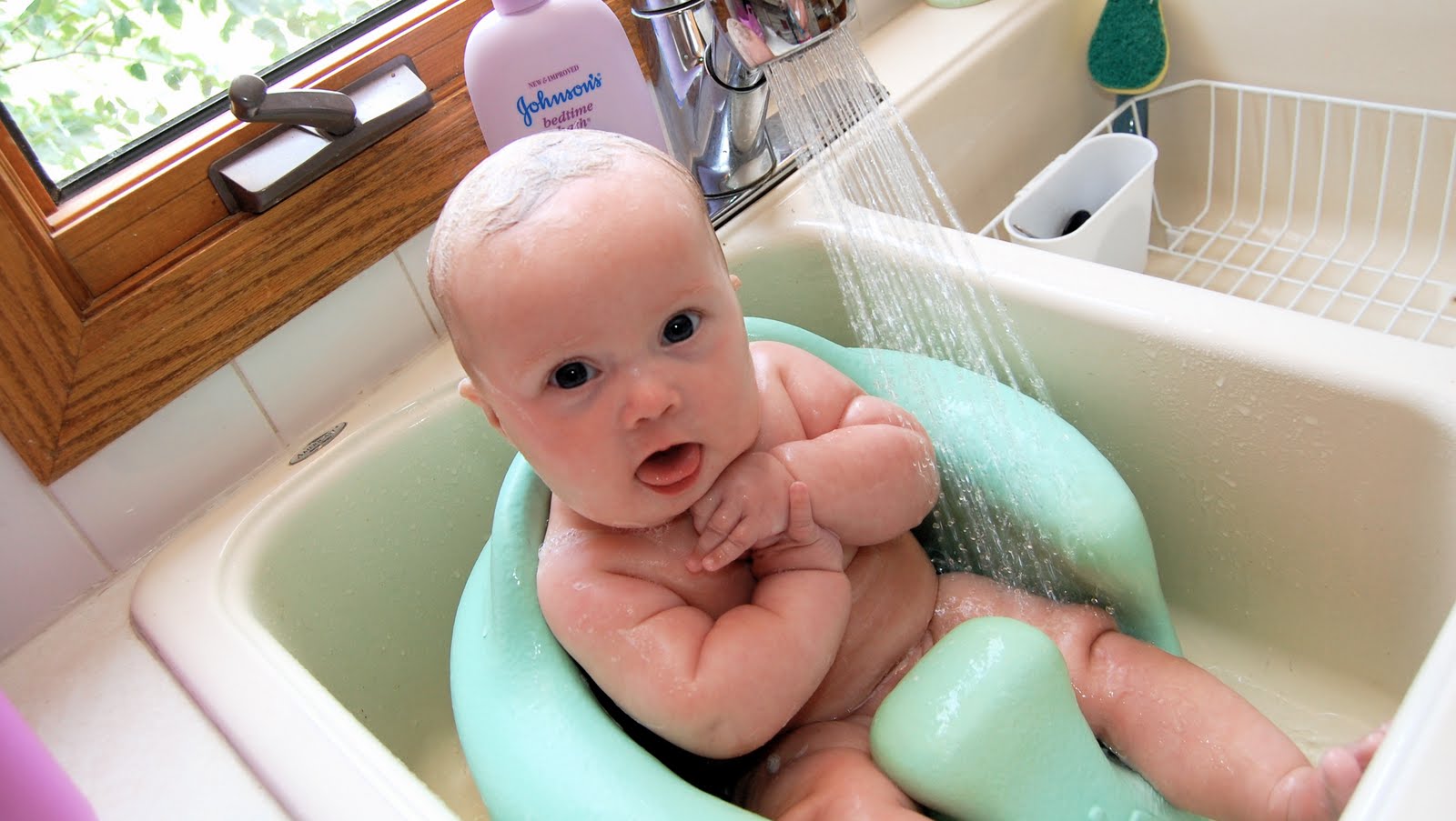 The Harnisch Family Baby Bathing in the Bumbo!