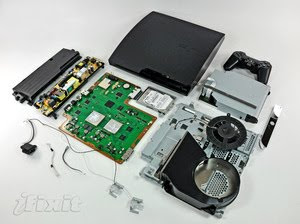 playstation 3 slim taken apart with all the bits laid out