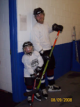 Josh and Kenz playing hockey