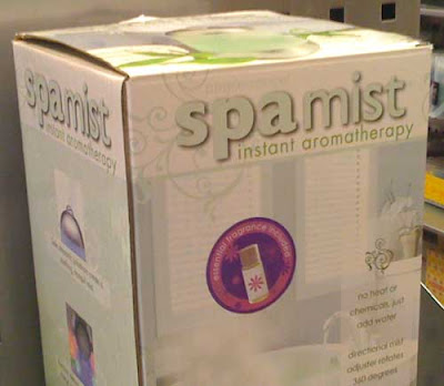 Photo of a box with the letters spamist at the top. The spa letters are bolder than the mist letters