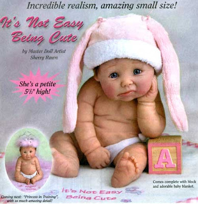 Photo ad of a white baby figurine with an unhappy expression as she wears a pink bunny ear hat
