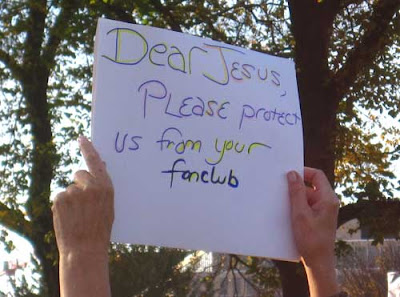Jesus, protect us from your fanclub, black and blue marker on white poster board with yellow highlighting