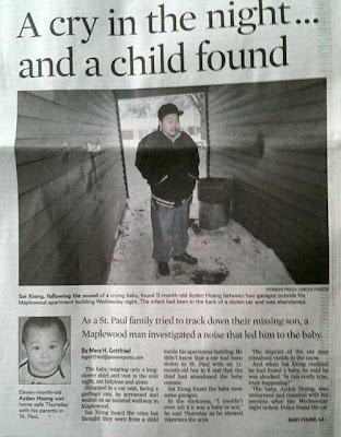 Pioneer Press article with large photo of an Asian man standing between two garages by a trash can