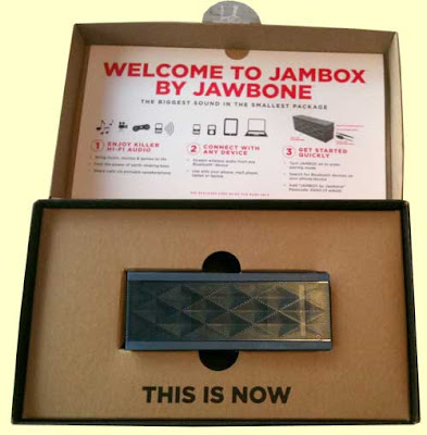 The opened Jambox package, revealing the product, a black rectangle abou 2 x 6 inches