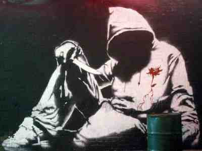 Banksy - Dead Hoodie With Knife (2008) photo Andy Rain