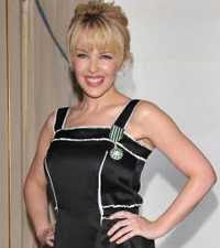 Kylie Minogue wearing her Chevalier Dans L'Orde Des Arts Et Des Lettres (5 May 2008)