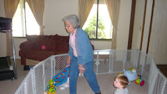 Grandma Henslee and baby playing the Wii