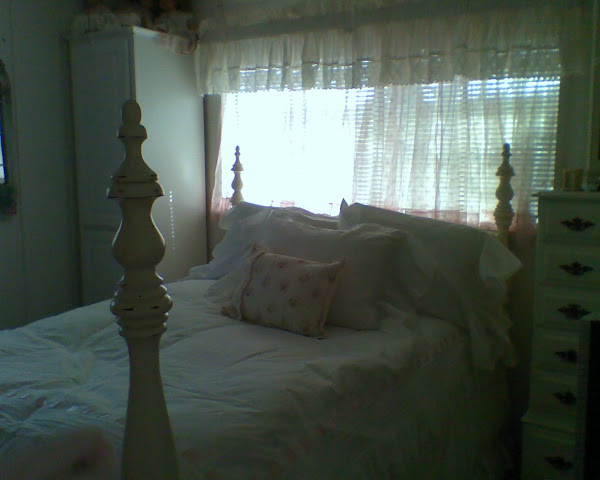 Her big bed in her little bedroom