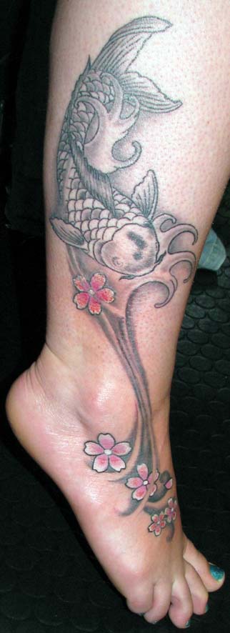 Just finished this very pretty little koi and sakura tattoo on Kerry's ankle