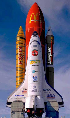 photo of the space shuttle with a bunch of sponser decals all over it
