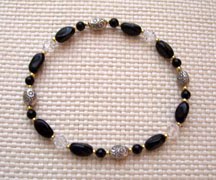 7.5" Onyx & Clear Bead Bracelet $25.00