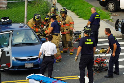 Holyoke Fire Rescue use the jaws of life on a car involved in an accident at the intersection of Dwight and Linden