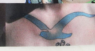 seagull tattoo on back body