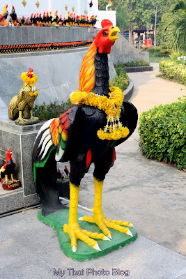 A lucky rooster cockerel outside the Phanthai Norasing shrine in Samut Sakhon Thailand