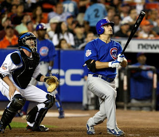 Jason Marquis becomes the second pitcher this year to hit a grand slam against the Mets