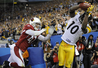 Santonio Holmes lands with two feet down -- in history