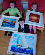 Pupils Conor, Dara and Maisie show some of the artists' work to the Press