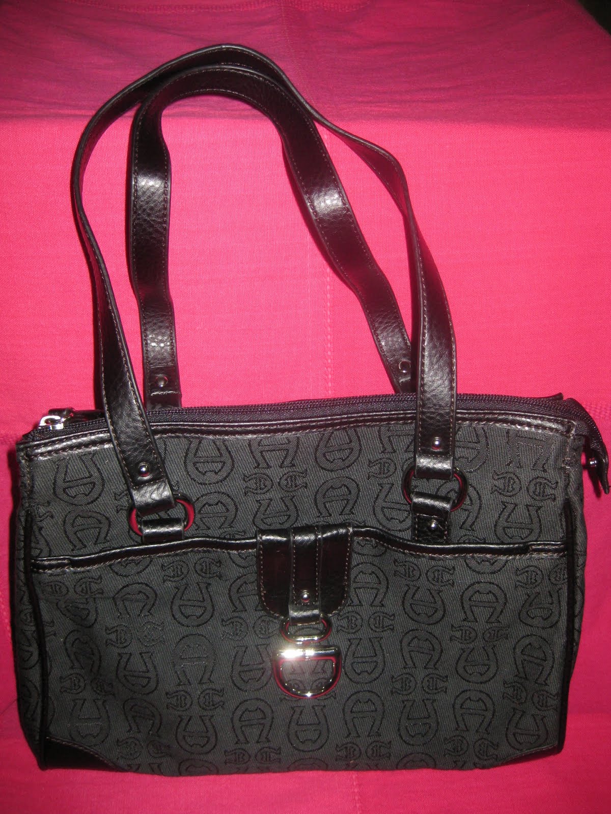 tastangan..... from tasglobal Etienne Aigner Black Handbag