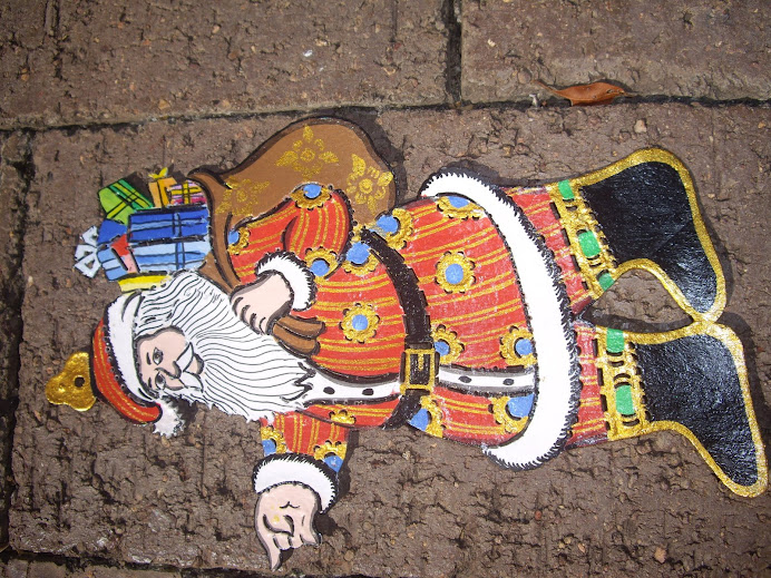 SANTA CLAUS CARRYING SACK OF PRESENTS--HANDMADE IN BALI, WAYANG KULIT-STYLE, HANGING TREE ORNAMENT